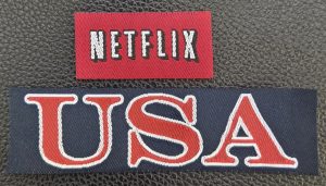 Examples of custom woven clothing labels for apparel brands