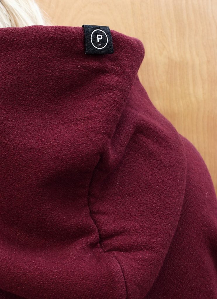 woven label looped on hoodie for clothing branding